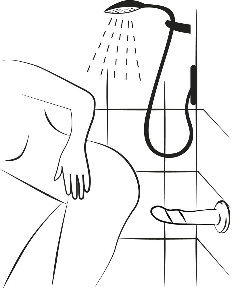 ROMP Piccolo Dildo με βεντούζα τοποθετημένο στο τοίχο σε πλακάκι μπάνιου ως τρόπο χρήσης