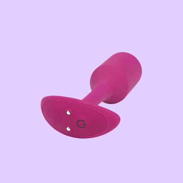 b-Vibe Snug Plug M Rose με Δόνηση σε ροζ χρώμα κάτω όψη με δυνατότητα φόρτισης