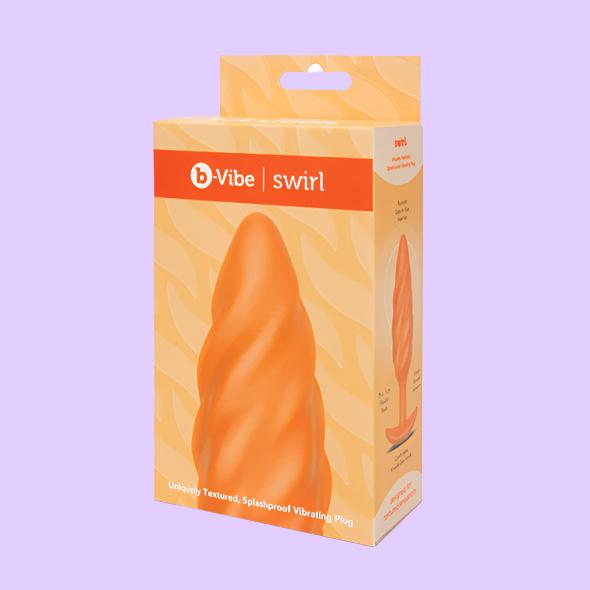 b-Vibe Swirl Texture Plug M Πρωκτική Σφήνα με Δόνηση και Ανάγλυφη υφή σε πορτοκαλί χρώμα σε συσκευασία